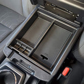 JKCOVER Tacoma center console tray in black trim provides organized storage