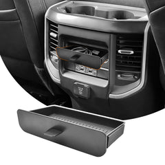 JLQP rear seat storage tray with cubby keeping cables organized in the Dodge Ram interior