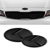 Julopo K-logo front hood emblem in carbon fiber black boosts sporty look.