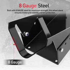 Wheel chock in workshop use for maintenance and bike stability.