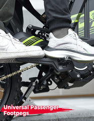 KEMIMOTO passenger footpegs in use on a muddy trail provide reliable foot support.