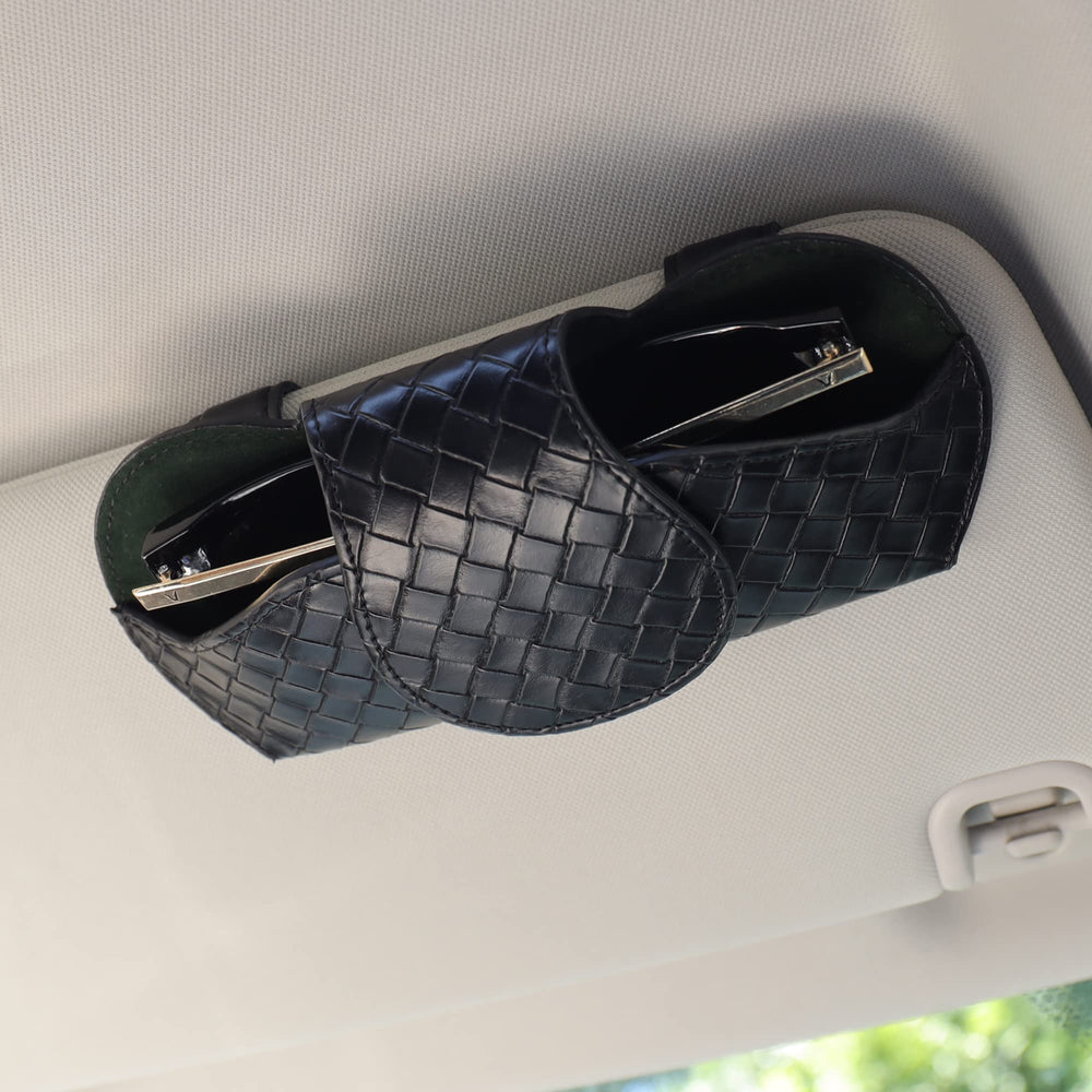 Compact car interior accessory for organized driving spaces.