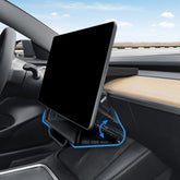 Klutchtech hideable under-screen storage behind the Tesla Model Y screen for quick access.