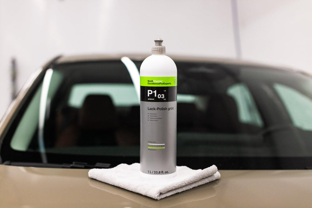 Koch-Chemie Lack Polish Grun P1.03 applied to car paint for depth and shine.