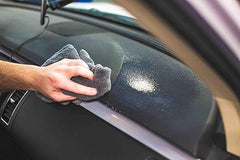 Result shows a refreshed dashboard plastic finish after applying KOCHCHEMIE Refresh Cockpit Care.