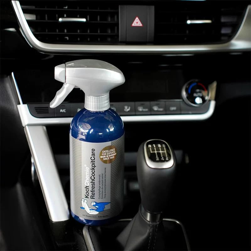 Like-new look on car dashboard plastics after applying KOCHCHEMIE product.