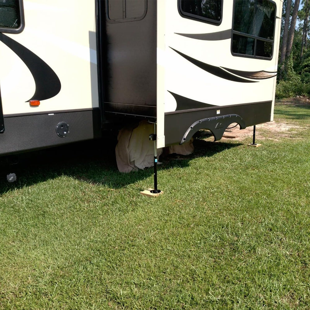 Two jacks with crank handle and drill socket simplify travel trailer setup