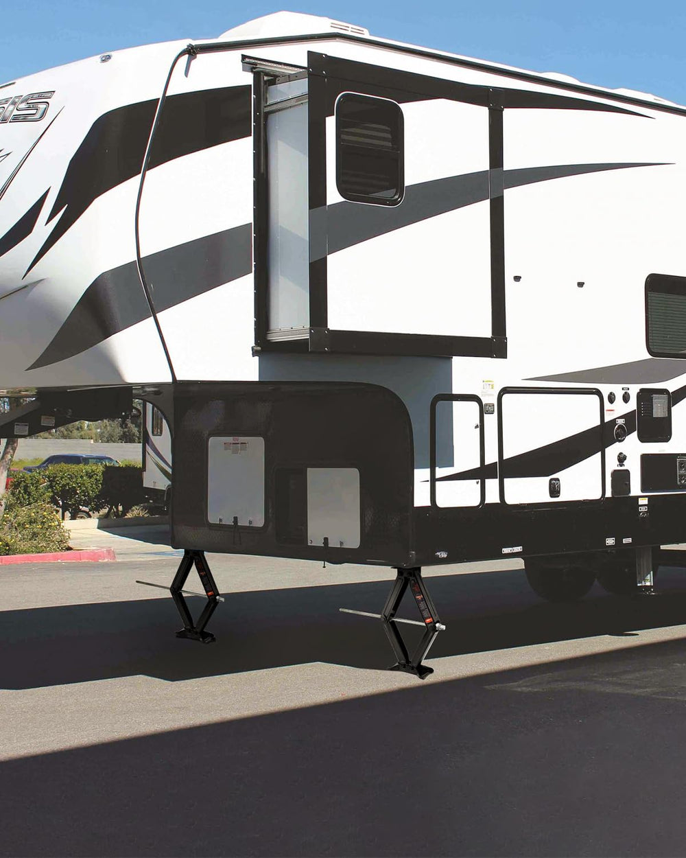 Kohree stabilizer jacks in use on a camper to achieve level alignment.