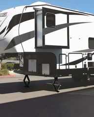 Kohree stabilizer jacks in use on a camper to achieve level alignment.