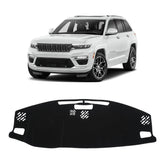KUST black dash cover for Jeep Grand Cherokee 4XE—front view with anti-slip backing.