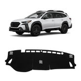 KUST black dash cover for Subaru Outback dashboard close-up showing glare protection.
