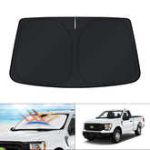 KUST windshield shade fitted to Ford trucks blocks sun and reduces heat.
