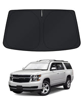 KUST windshield shade on Suburban front window blocks sun and heat.