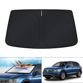 KUST windshield shade on VW Tiguan, precise fit covering windshield for reduced glare and heat