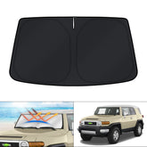 KUST windshield shade installed on a Toyota FJ Cruiser for UV protection and cooling.