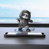 Kwak's skateboarding bear on dashboard glides smoothly for playful drives.