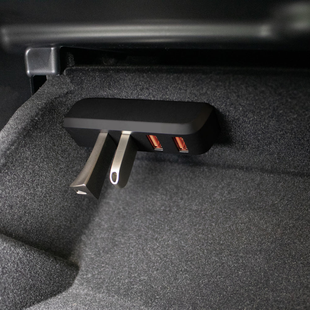 Leikaendi glove box USB hub installed in Model Y, boosts dashcam access.