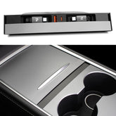 Leikaendi USB hub installed in a Tesla center console for tidy charging.