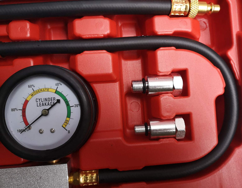 In-use compression testing setup with dual gauges measuring leakage