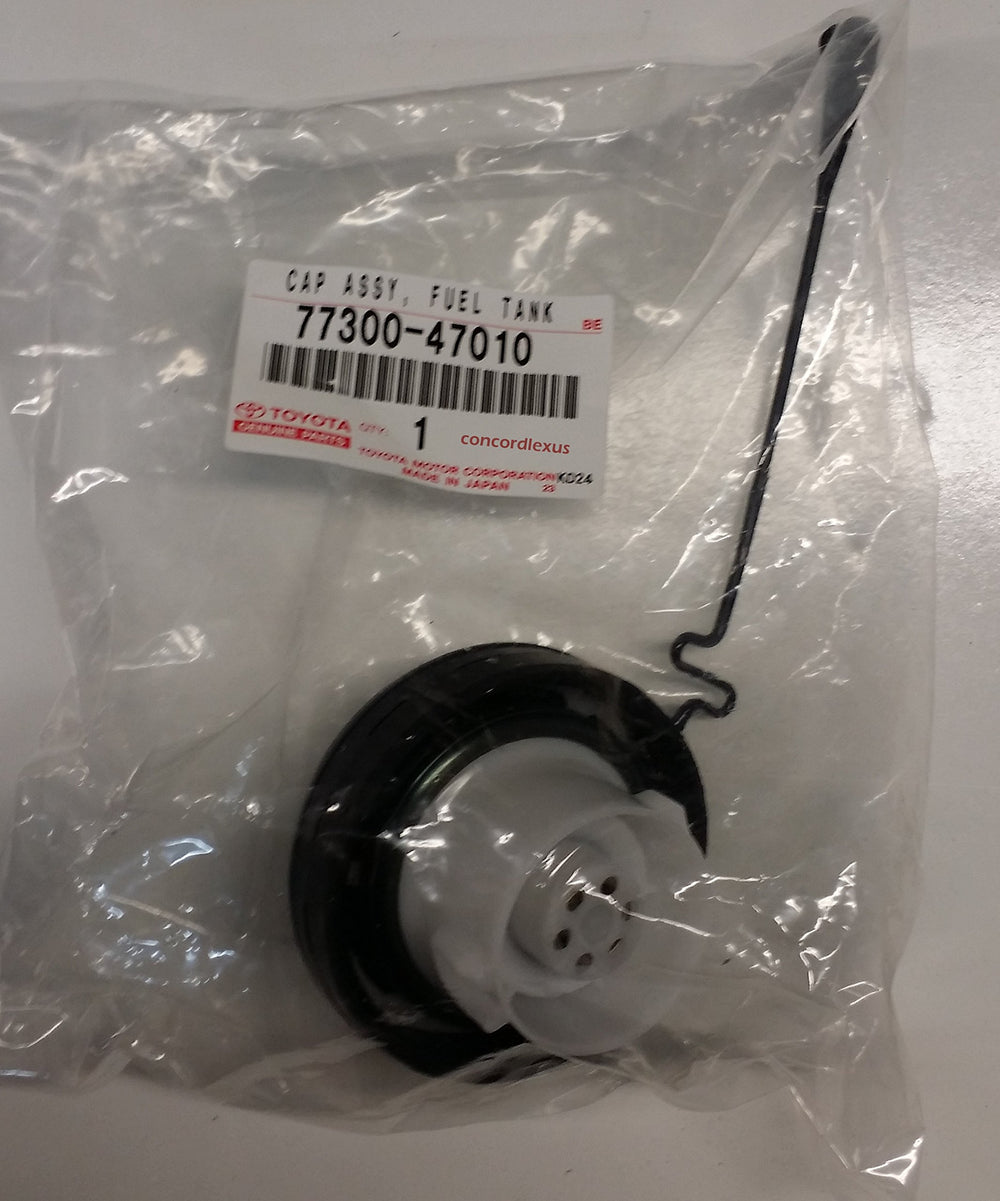 LEXUS fuel tank cap 77300-47010 close-up showing secure OEM seal