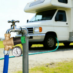 LIULO TOOL regulator in-use with hose demonstrates steady outdoor water pressure