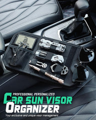 LIVANS visor organizer mounted in a vehicle showing accessible front pocket.