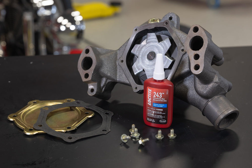 Close-up of Loctite 243 blue cap on bolt for secure fastening.