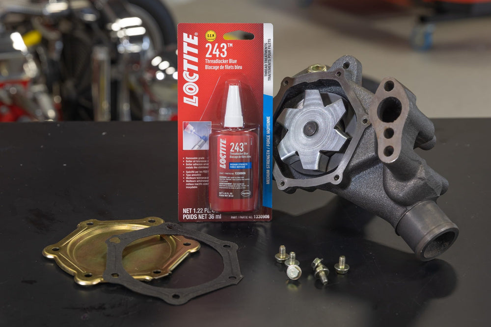 Loctite 243 on bolt threads demonstrates oil-tolerant bonding in engines.