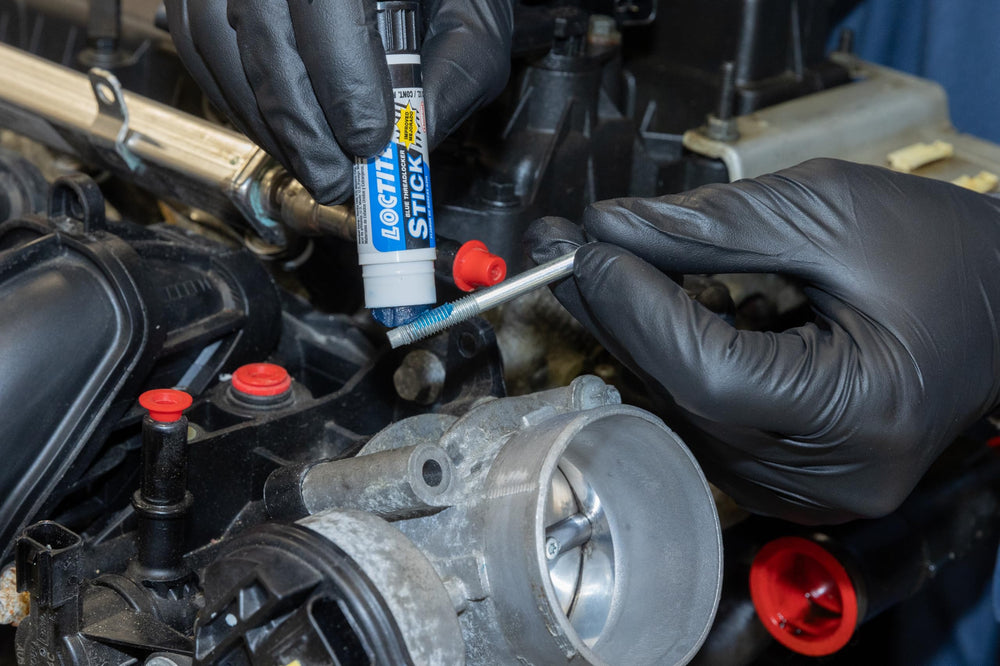 Applying Loctite 37643 blue threadlocker to bolt threads