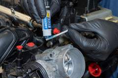 Applying Loctite 37643 blue threadlocker to bolt threads