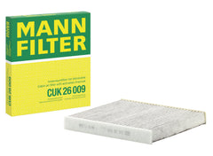 MANN-FILTER CUK 26 009 cabin filter with activated carbon blocks fine particles for cleaner air.