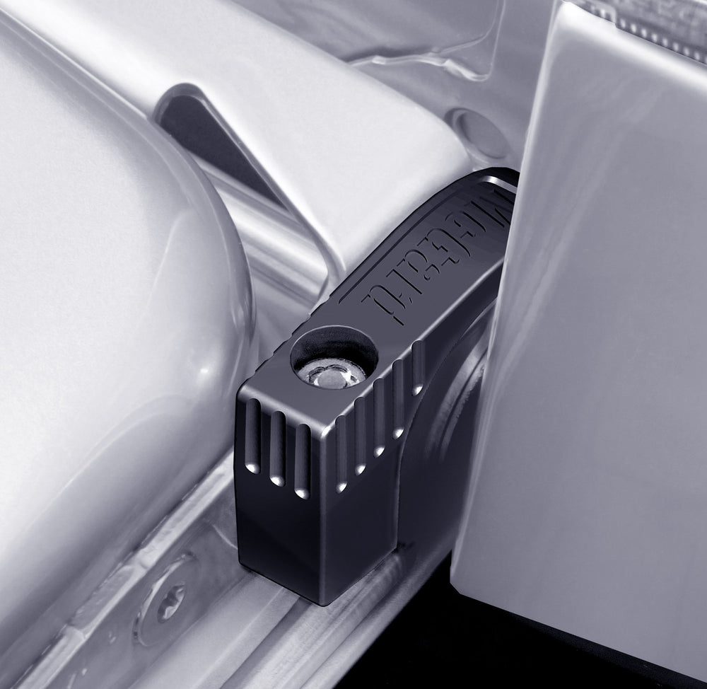McGard 76029 tailgate lock installed on vehicle for theft protection.