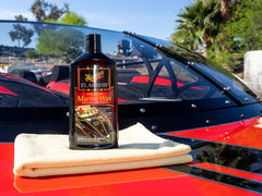 Meguiar's Flagship Premium Marine Wax polishing illustrates deep color enrichment with a polisher.
