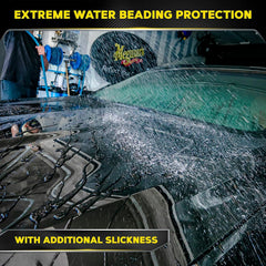 Meguiar's Hybrid Ceramic Liquid Wax water beading closeup shows hydrophobic surface effect.