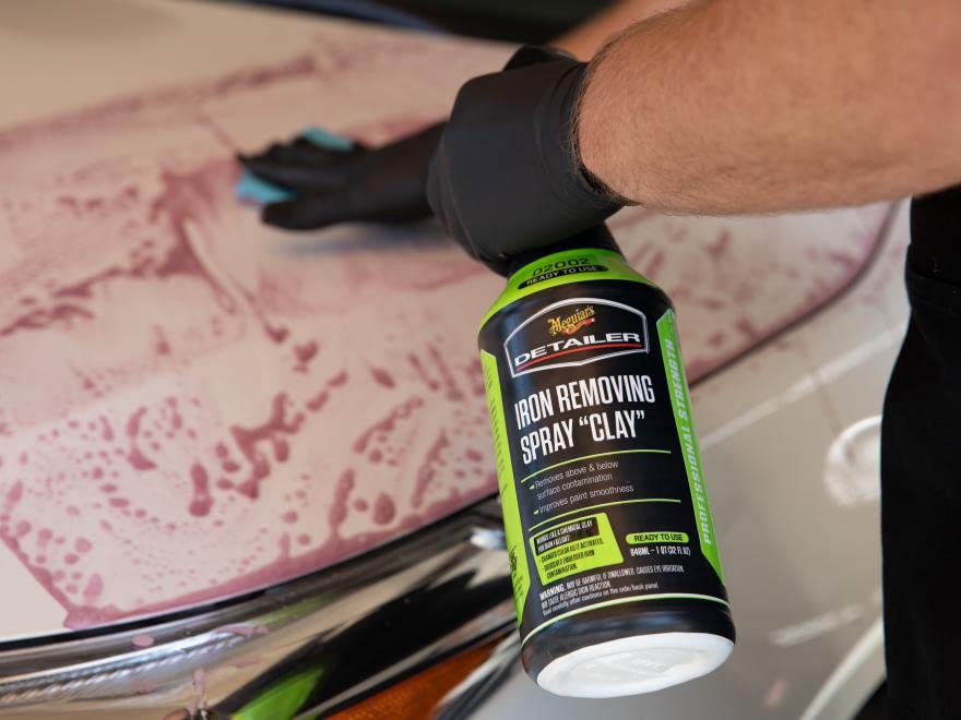 Meguiar's spray on paint surface highlighting preparation for faster correction.