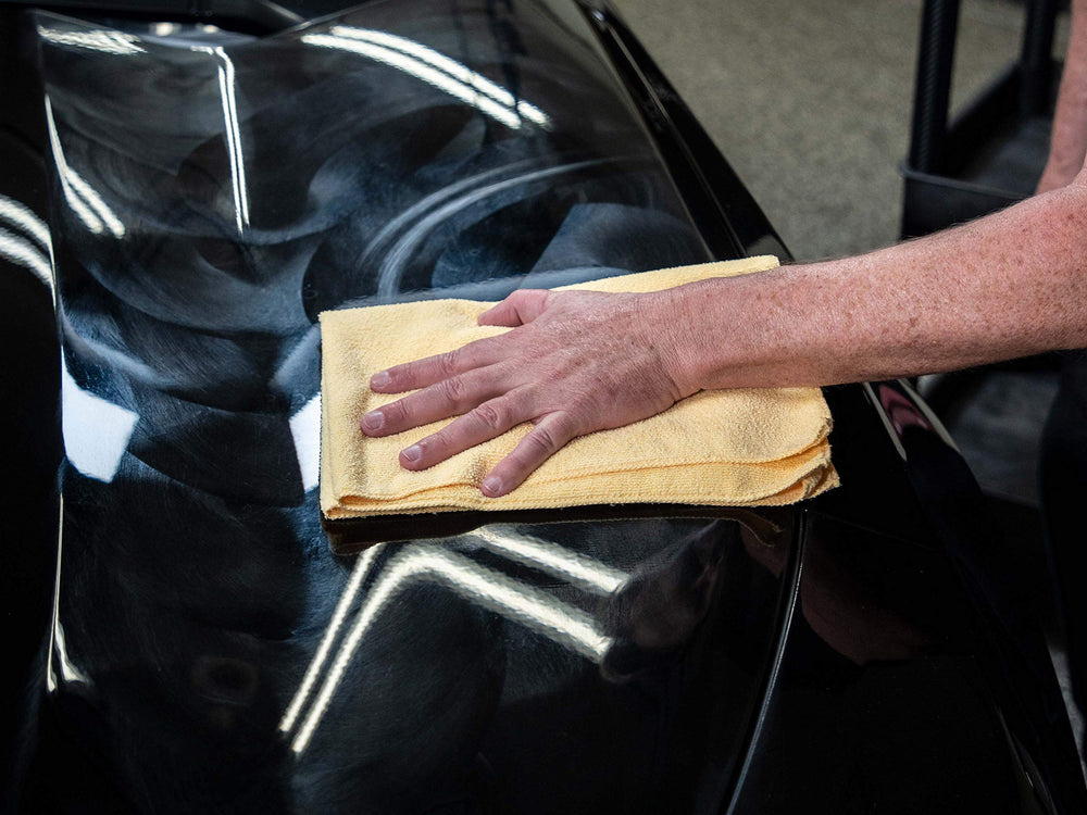 Meguiar's Yellow Wax delivers color-rich shine safe for clear coats on painted surfaces.