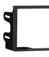 Metra 95-9012 dash kit installed, showing OEM-like finish in the VW interior