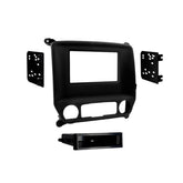 Metra 99-3014G custom-fit mounting kit installed in Chevy Silverado dash for seamless radio installation