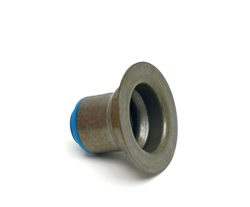 Integrated spring locators aid proper seal seating and leak prevention
