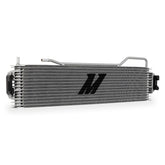 Mishimoto MMTC-K2-14 transmission cooler close-up showing stacked-plate core for heat dissipation.