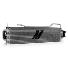 Mishimoto MMTC-K2-14 transmission cooler close-up showing stacked-plate core for heat dissipation.