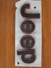 Mopar Jeep Wrangler JL gray badge front view showing authentic OEM styling