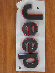 Mopar Jeep Wrangler JL gray badge front view showing authentic OEM styling