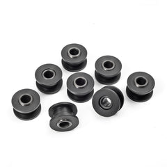 MOTO1988 components laid out: 16 bushings and 8 sleeves for replacement.