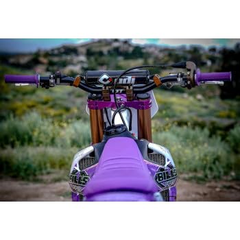 MOTOMXHOUSE ODI MX V2 grip in use, purple, enhanced control during enduro sessions