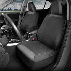 Close-up of Motor Trend cloth front seat fabric showing stitching and texture.