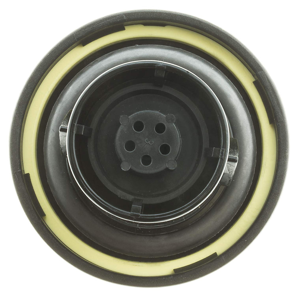 MotoRad locking fuel cap in use inside a vehicle during refueling
