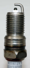 Motorcraft SP-479 close-up threads show precise fit for quick replacement