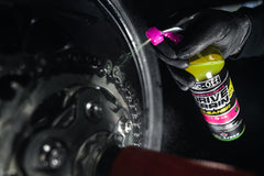 Muc-Off Powersports Drivetrain Cleaner applied to drivetrain components for a renewed look