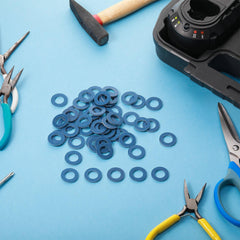 Mudder blue oil pan drain plug gasket providing a precise seal for fittings.